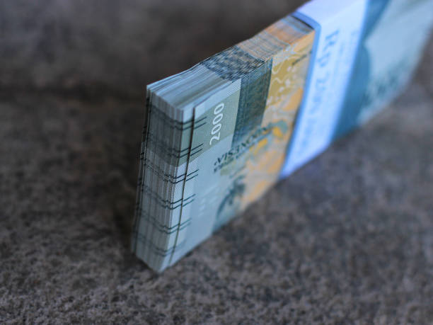 istock A pile of two thousand rupiah bills 1492754743