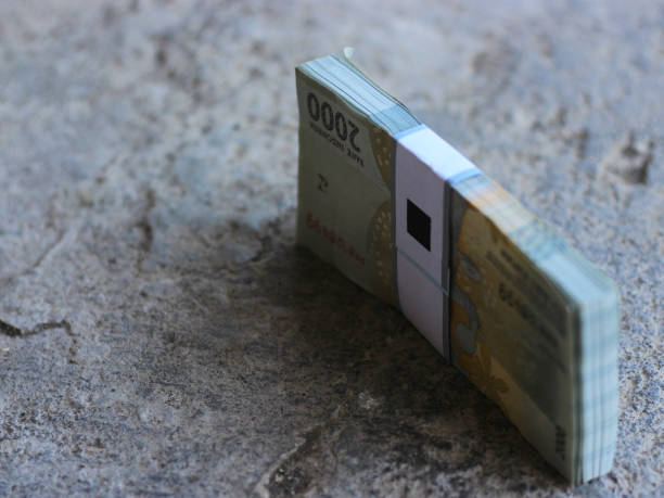 istock A pile of two thousand rupiah bills 1492756577