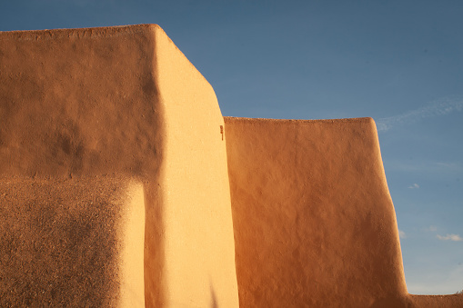 Sunset on Adobe walls, San Francisco de Asis Church, Taos New Mexico