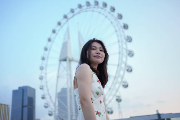 istock girl with ferris wheel 1492767464