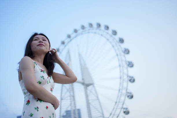istock girl with ferris wheel 1492767542