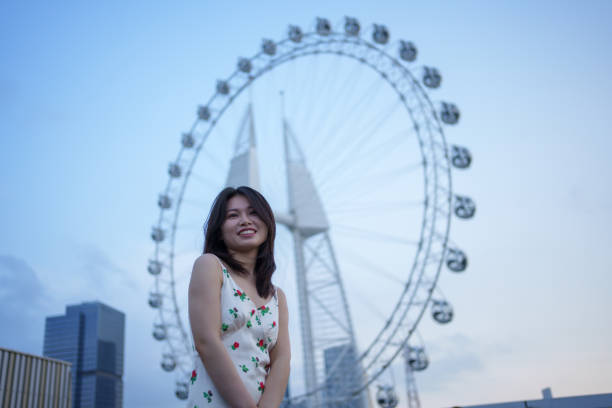 istock girl with ferris wheel 1492767640
