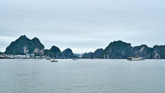 Ha Long is the capital of Quang Ninh province in northeastern Vietnam, near the famous scenic spot and World Natural Heritage site Ha Long Bay on the sea.\nHa Long is also a port city and a tourist city.\nThese photos were taken on a yacht.