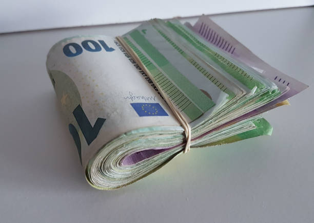istock money banknotes euro 100 isolated on a white table 1492773142