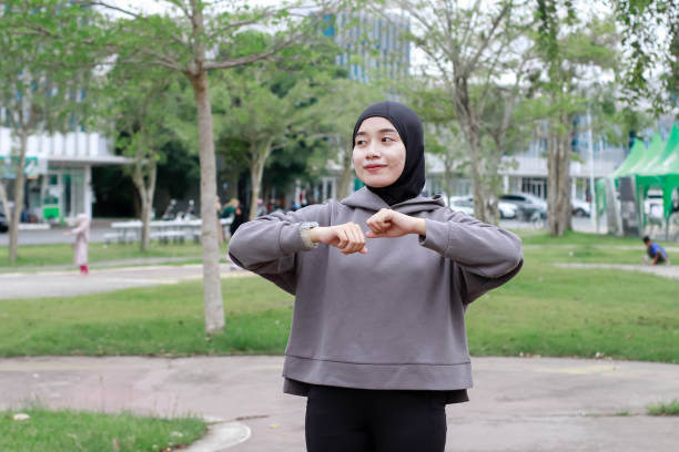 istock asian young muslim female excercise at park 1492780554
