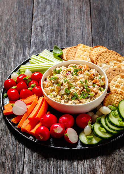 istock salmon salad with fresh veggies and crackers 1492784159