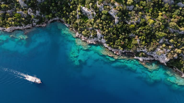 Simena - submerged ancient Lycian city Kekova island Ruins of ancient architecture, aerial view of sunken historical sunken city, place to explore submarine, clean submarine, discovery point for divers, a boat for a cruise in the sunken city