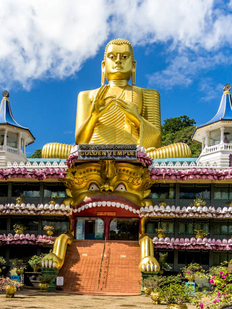 istock Golden buddha statue at Dambulla 1492790368
