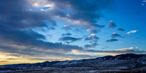 istock Spectacular landscape featuring snow-covered mountains 1492795630