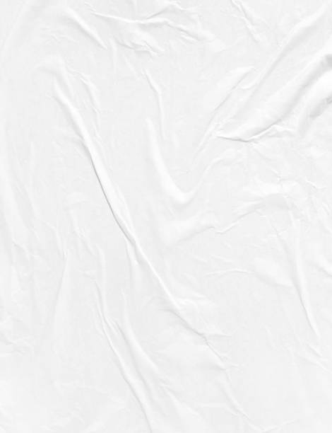 istock White creased paper background with copy space for wallpapers 1492795769