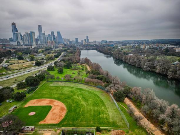 istock a park on the side of a river surrounded by grass 1492797743