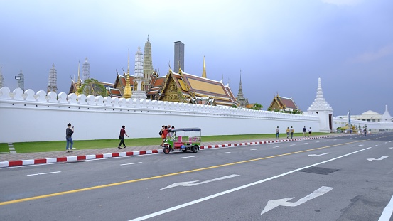 Bangkok, Thailand – December 01, 2022: An image of the Temple of the Emerald Buddha situated in a foggy landscape
