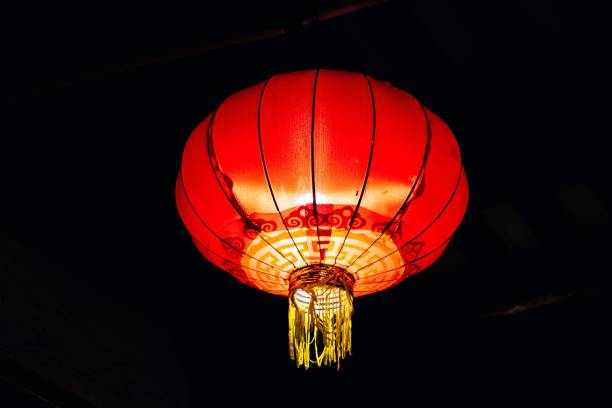 istock Bright red Chinese lantern against a black background. 1492799466