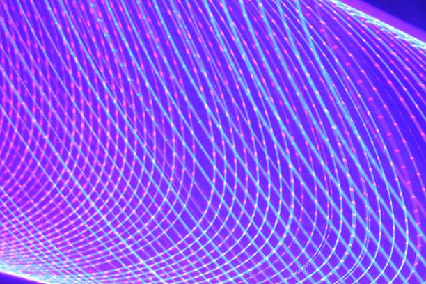 istock Large display featuring a pattern of blue and pink lights radiating outward along distinct lines 1492804016