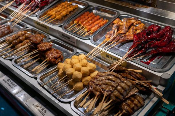 istock Silver tray of assorted skewered food on display in Malaysia. 1492806310