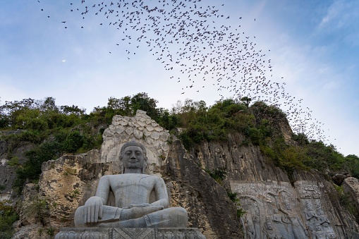 The statue of Buddha in the Bat Cave in Battambang, Cambodia