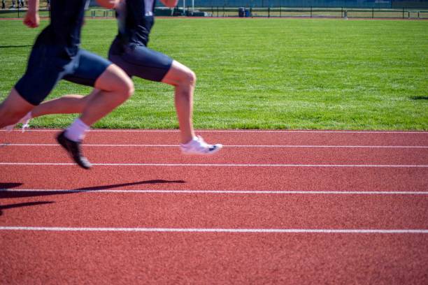 istock Two youthful racers sprinting on an athletic track 1492809177
