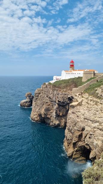 istock Majestic lighthouse atop a cliff overlooking the ocean, Sagres 1492809416