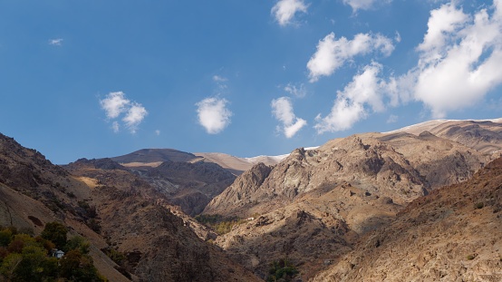 A scenic view of the Alborz mountains on a sunny day in Iran