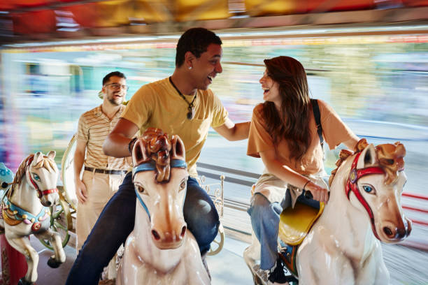 istock Merry-go-round carousel ride in blurred motion! 1492812682