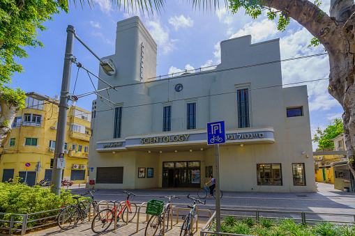 Tel-Aviv, Israel - May 21, 2023: View of the historic Alhambra theater building, with locals and visitors, in Jaffa, now part of Tel-Aviv-Yafo, Israel