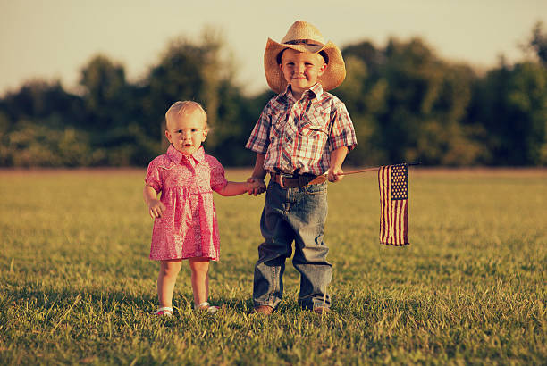 American Kids Stock Photo - Download Now - Baby - Human Age, Cowboy Hat, - iStock