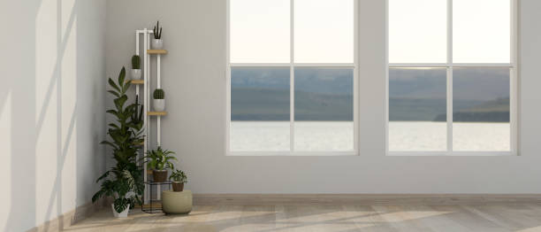 istock Interior design of an empty room with cactus shelf, window, parquet floor and white wall 1492822605