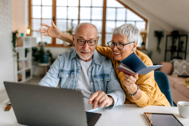istock Senior couple booking their flight 1492832336