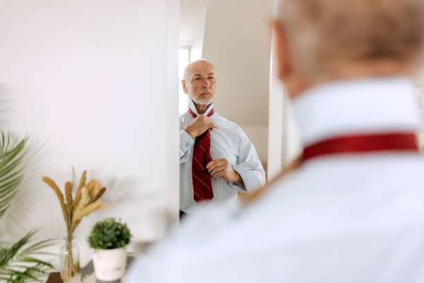 istock Senior man getting ready for business trip 1492832556