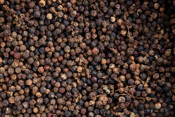 istock Full frame shot of black peppercorns 1492833741