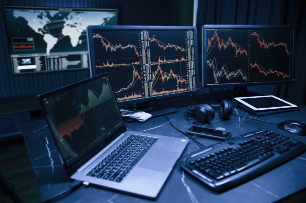 istock Multiple screens with information. Cyber criminal haker dark room for massive attack of corporate big data servers 1492839257