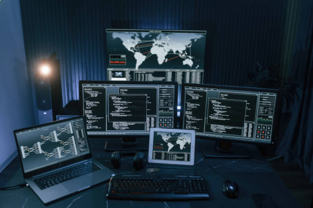 istock Multiple screens with information. Cyber criminal haker dark room for massive attack of corporate big data servers 1492839378