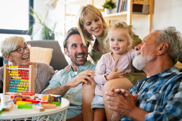 istock Cheerful multi-generation family having fun while spending time together at home. 1492845397