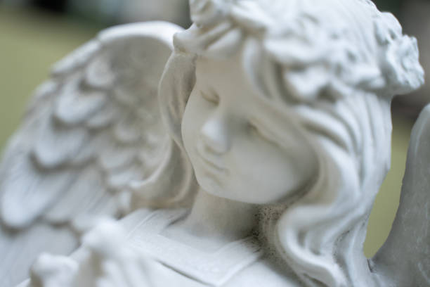 istock Cupid stucco doll, white girl, blurred, dream image concept 1492846443
