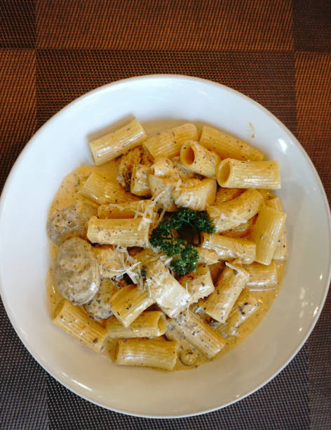 Italian sausage with truffle and mushroom cream sauce