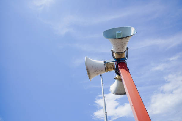 istock A loudspeaker on a pole against a blue sky background 1492858231