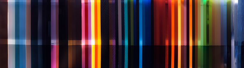 abstract colorful background of plastic sheets with reflection