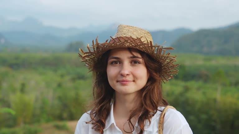 Woman looking at Khao Sok National park mountains