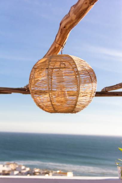 istock Beautiful handmade lamp on a hostel rooftop in Taghazout, Morocco. 1492863407