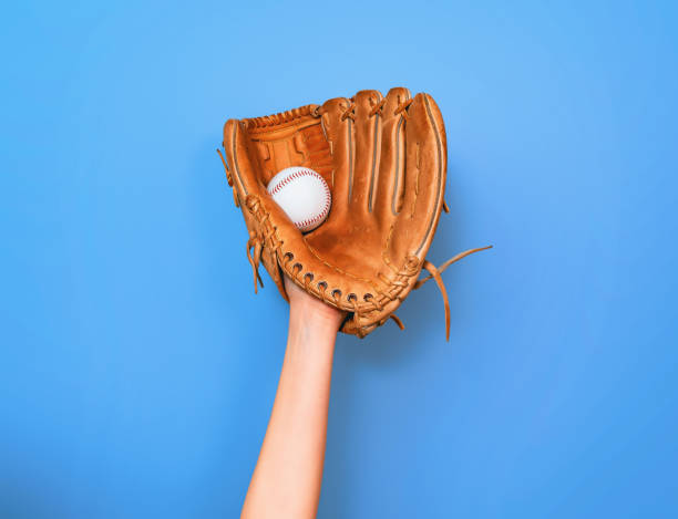 leather baseball glove caught a baseball for the game - baseball baseballs catching baseball glove imagens e fotografias de stock