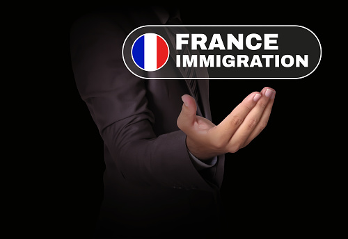 Immigration to France concept background with design hovering on the hand