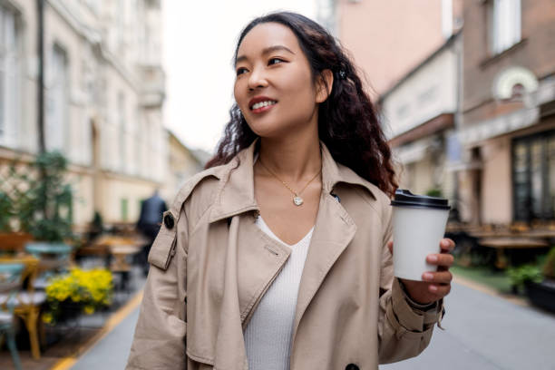 istock Successful young asian businesswoman on a coffee break 1492872488