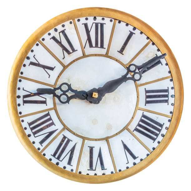 istock Old clock face with roman numbers isolated on a white background 1492875138