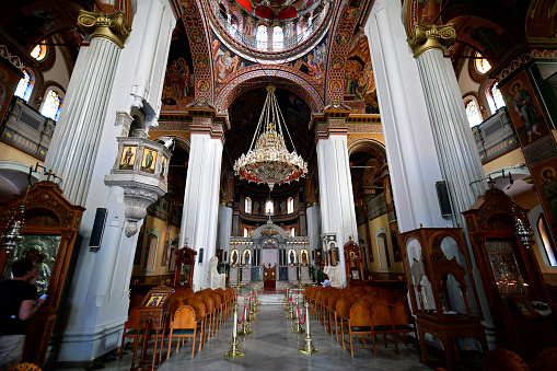 Iraklio, Greece - October 14, 2022: Interior view of the cathedral with religious ceiling paintings and ornate chandeliers of Saint Minas Cathedral in the capital of Crete Island, the orthodox church is dedicated to Saint Menas the martyr and wonderworker