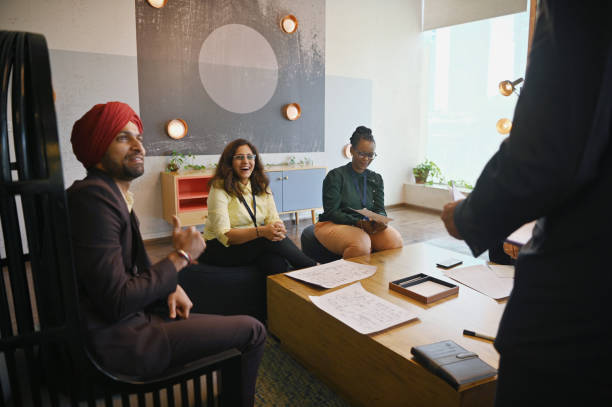 Diverse group of engineers team members engaged in a conversation