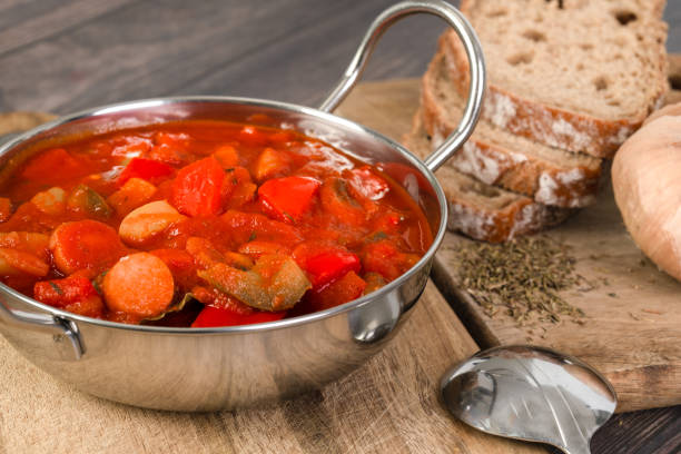 Lecso, Hungarian stew with peppers, onions and sausages Traditional Hungarian stew with peppers and sausage hungarian dish lecso stock pictures, royalty-free photos & images