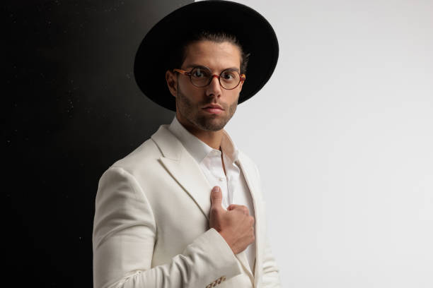istock male model arranging his collar with style 1492882772