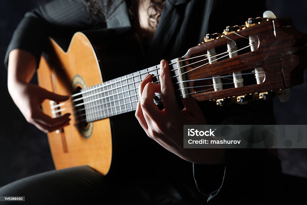 classic guitar Musician playing classic  guitar Adult Stock Photo