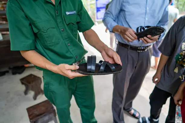 Photo of Handmade Rubber Slippers Made From Car Tire in Cu Chi tunnel, Vietnam