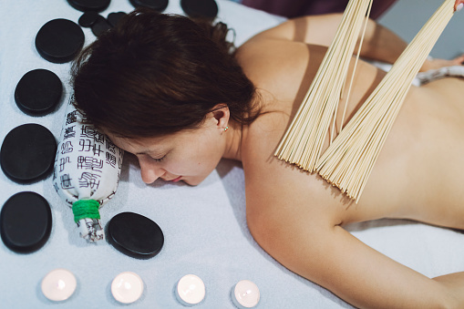 Bamboo relax massage at spa salon